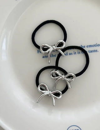 Set of mini elastic hair ties for children and girls.