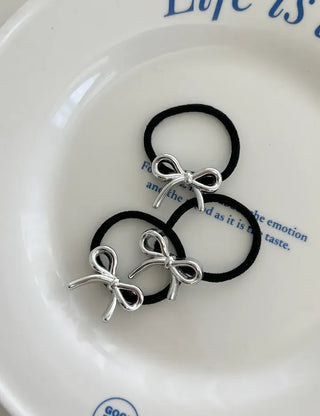 Set of mini elastic hair ties for children and girls.