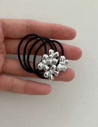Set of mini elastic hair ties for children and girls.