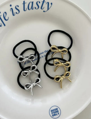 Set of mini elastic hair ties for children and girls.