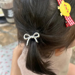 Set of mini elastic hair ties for children and girls.