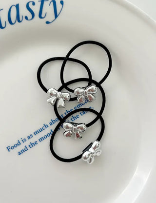 Set of mini elastic hair ties for children and girls.
