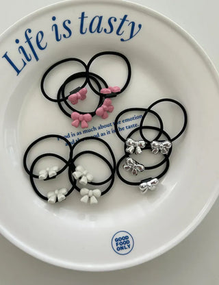 Set of mini elastic hair ties for children and girls.