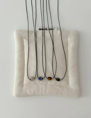 Gemstone cord necklace surgical steel knot cord beads