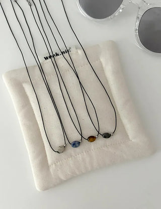 Gemstone cord necklace surgical steel knot cord beads