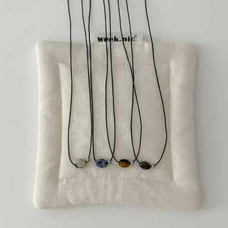 Gemstone cord necklace surgical steel knot cord beads