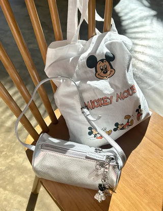 Two-way cowhide round mini silver crossbody bag