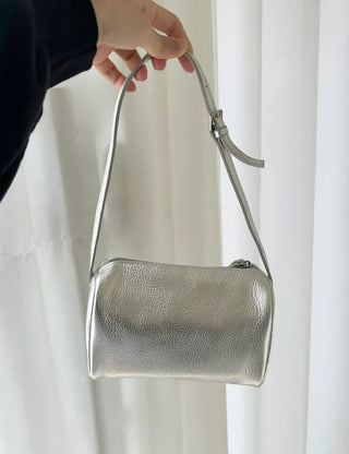 Two-way cowhide round mini silver crossbody bag