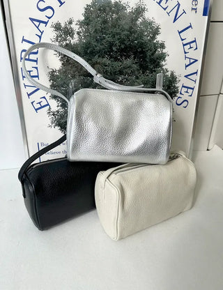 Two-way cowhide round mini silver crossbody bag