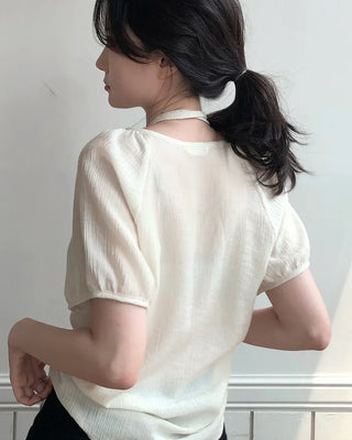 Strappy short-sleeved blouse