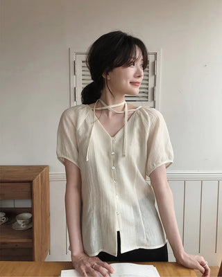 Strappy short-sleeved blouse