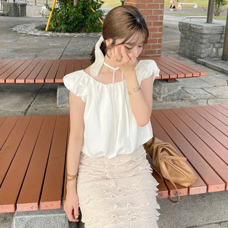 Back ribbon shirred blouse