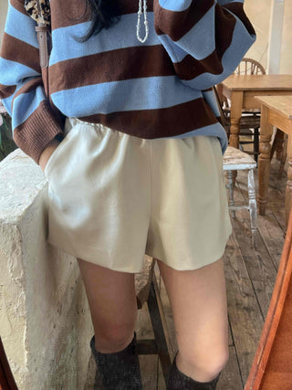 Tailored high-waisted leather wide shorts