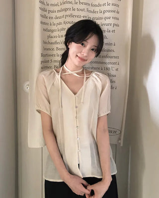 Strappy short-sleeved blouse