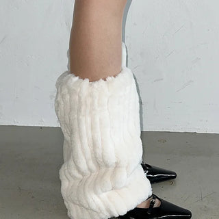 Embo eco-fur leg warmers in