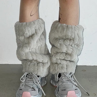 Embo eco-fur leg warmers in
