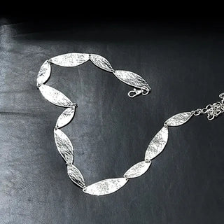 Flat-shaped silver belt