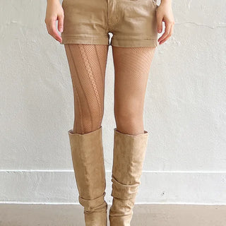 Unbalanced fishnet stockings, water bomb festival look, bohemian core