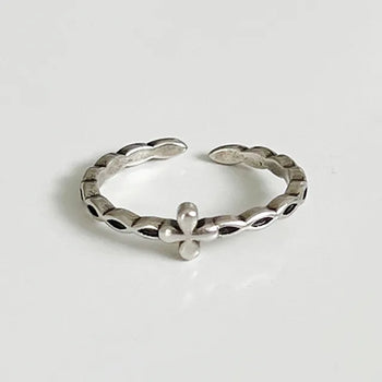 Stitched cross guard ring silver ring