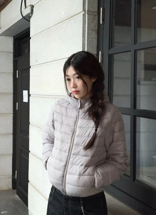 Snowy twisted cable knit hooded padded vest