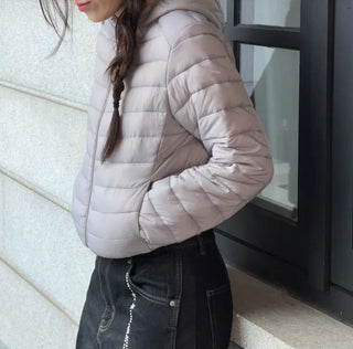 Snowy twisted cable knit hooded padded vest