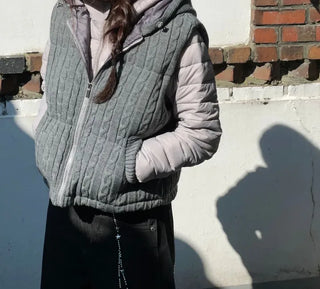 Snowy twisted cable knit hooded padded vest