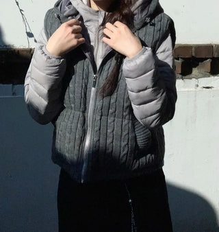 Snowy twisted cable knit hooded padded vest