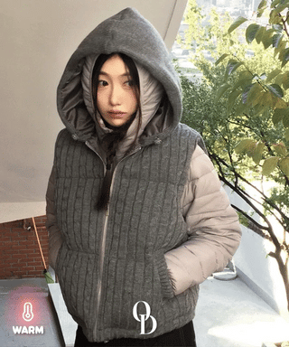 Snowy twisted cable knit hooded padded vest