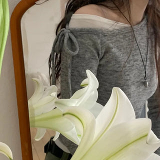 Mio color blocking ribbon one-shoulder knit in