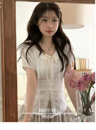 Soleil ribbon strap pin tuck slim fit button puff short sleeve blouse