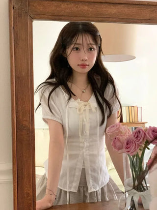 Soleil ribbon strap pin tuck slim fit button puff short sleeve blouse