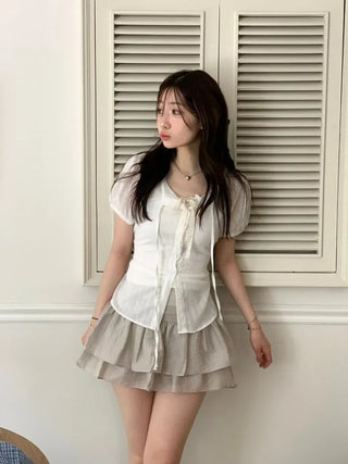 Soleil ribbon strap pin tuck slim fit button puff short sleeve blouse