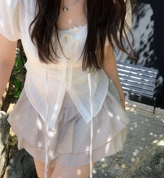 Soleil ribbon strap pin tuck slim fit button puff short sleeve blouse