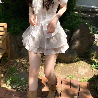 Soleil ribbon strap pin tuck slim fit button puff short sleeve blouse