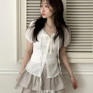 Soleil ribbon strap pin tuck slim fit button puff short sleeve blouse