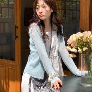 Poine linen delicate loose fit mother-of-pearl button long sleeve knit cardigan