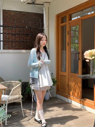 Poine linen delicate loose fit mother-of-pearl button long sleeve knit cardigan