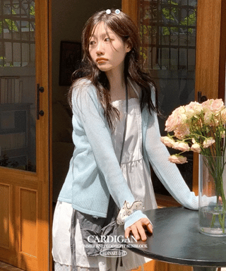 Poine linen delicate loose fit mother-of-pearl button long sleeve knit cardigan