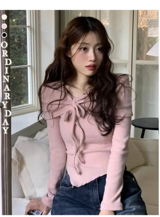 Shabby ribbon shirring loose fit off-shoulder wave long sleeve knit
