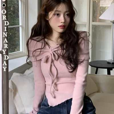 Shabby ribbon shirring loose fit off-shoulder wave long sleeve knit