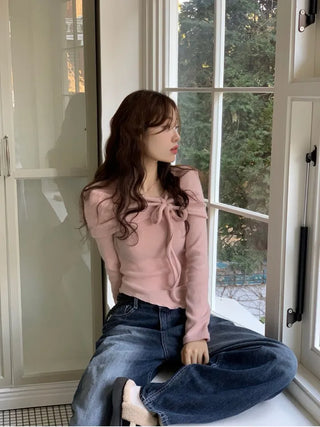 Shabby ribbon shirring loose fit off-shoulder wave long sleeve knit