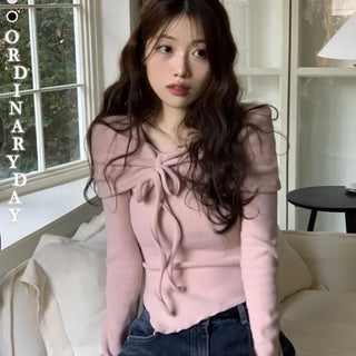 Shabby ribbon shirring loose fit off-shoulder wave long sleeve knit