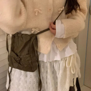 Bob Ribbon A-Line Loose Fit Button Brush Knit Cardigan