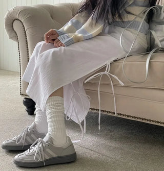Rear-breasted ribbon side-slit banding long skirt
