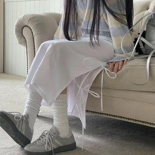 Rear-breasted ribbon side-slit banding long skirt