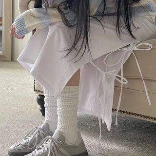 Rear-breasted ribbon side-slit banding long skirt