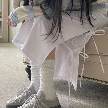 Rear-breasted ribbon side-slit banding long skirt