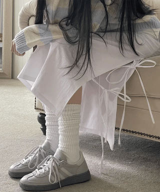 Rear-breasted ribbon side-slit banding long skirt