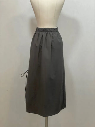 Rear-breasted ribbon side-slit banding long skirt