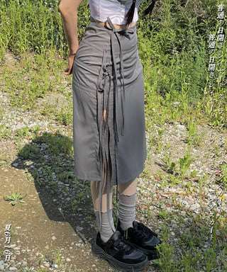 Side slit strap layered binding skirt